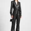 Maniere De Voir Vegan Leather Fit And Flare Belted Jumpsuit | Jumpsuits & Playsuits